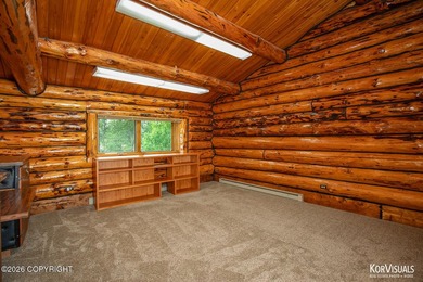 Experience the warmth and character of log home living in this - photo 14