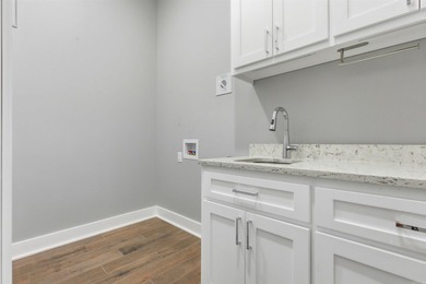Luxury lakefront living awaits in this custom-built 2022 home on - photo 14
