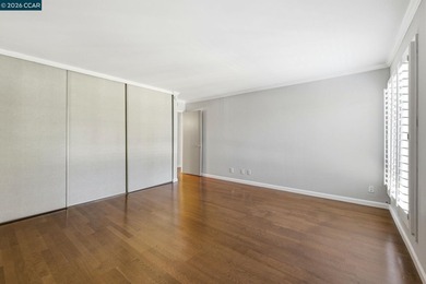 Stylishly updated end-unit condo with a large private deck &