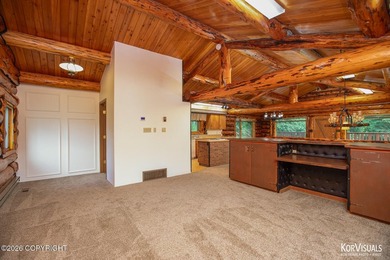 Experience the warmth and character of log home living in this - photo 15