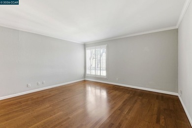 Stylishly updated end-unit condo with a large private deck &