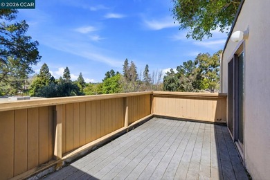 Stylishly updated end-unit condo with a large private deck &