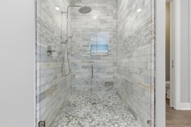 Luxury lakefront living awaits in this custom-built 2022 home on - photo 21