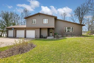 Set on 136 feet of shoreline on desirable Lake Ida, this 4 - photo 1