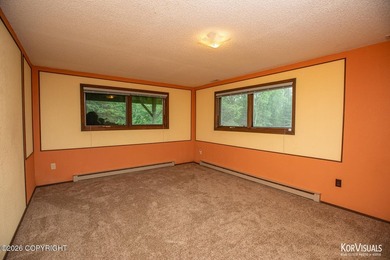 Experience the warmth and character of log home living in this - photo 22