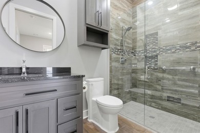 Luxury lakefront living awaits in this custom-built 2022 home on - photo 25