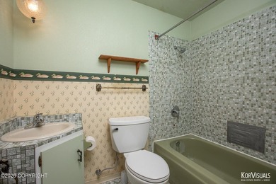 Experience the warmth and character of log home living in this - photo 26