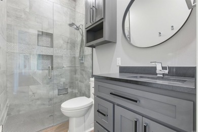Luxury lakefront living awaits in this custom-built 2022 home on - photo 26