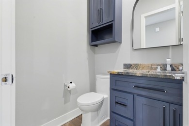 Luxury lakefront living awaits in this custom-built 2022 home on - photo 32