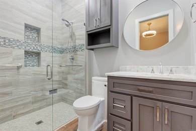 Luxury lakefront living awaits in this custom-built 2022 home on - photo 33