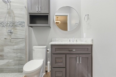 Luxury lakefront living awaits in this custom-built 2022 home on - photo 34