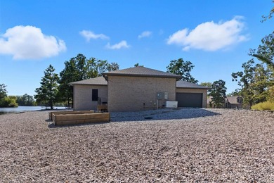 Luxury lakefront living awaits in this custom-built 2022 home on - photo 36
