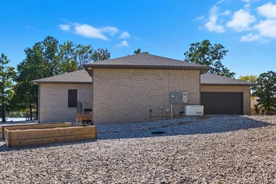 Luxury lakefront living awaits in this custom-built 2022 home on - photo 46