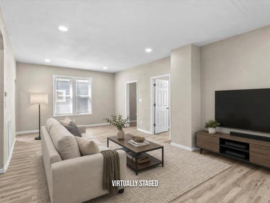 This beautifully renovated 5-bedroom, 2-bath home has been - photo 5