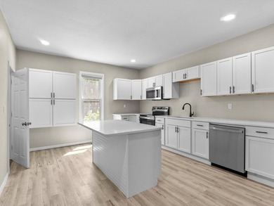 This beautifully renovated 5-bedroom, 2-bath home has been - photo 9
