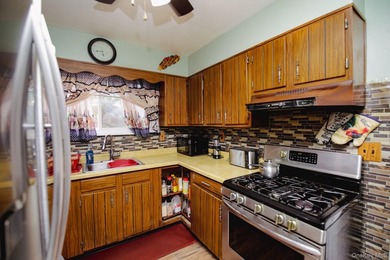 Legal two-family Colonial tucked away on large cul-de-sac - photo 16