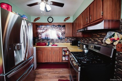 Legal two-family Colonial tucked away on large cul-de-sac - photo 17