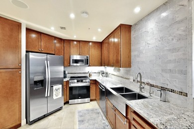 Discover this beautifully updated 2-bedroom, 2-bath condo on the - photo 2