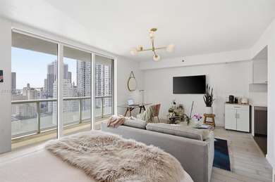 Spacious studio with updates and gorgeous West sunset views. New