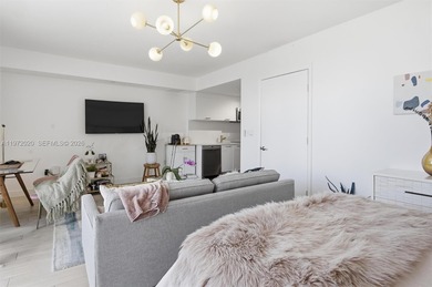 Spacious studio with updates and gorgeous West sunset views. New