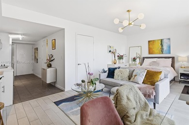 Spacious studio with updates and gorgeous West sunset views. New