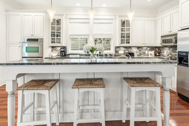 Welcome to 53 Creek Bridge Way, a refined coastal retreat - photo 13