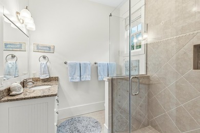 Welcome to 53 Creek Bridge Way, a refined coastal retreat - photo 23