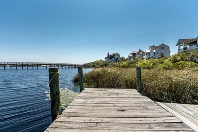 Welcome to 53 Creek Bridge Way, a refined coastal retreat - photo 48