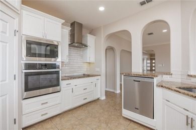 Live just steps from the beach, surf, and sunshine in this - photo 9