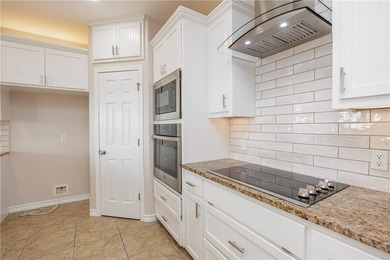 Live just steps from the beach, surf, and sunshine in this - photo 10