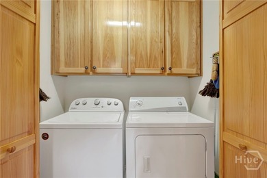 This custom-built coastal cottage sits on a scenic bluff - photo 22