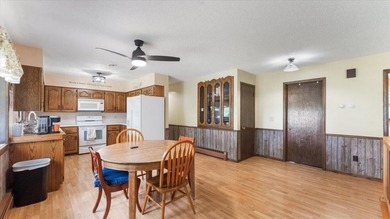 Welcome to this spacious 4-bedroom, 3-bath rambler just minutes - photo 7