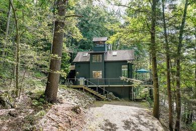 Tree House Cottage is a magical property overlooking Hosmer Pond - photo 2