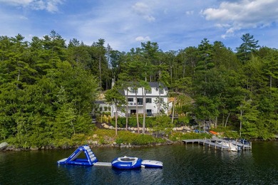Set on nearly an acre with 201 feet of pristine Lake - photo 2