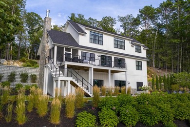 Set on nearly an acre with 201 feet of pristine Lake - photo 4