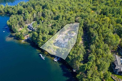 Set on nearly an acre with 201 feet of pristine Lake - photo 8