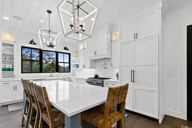 Set on nearly an acre with 201 feet of pristine Lake - photo 10