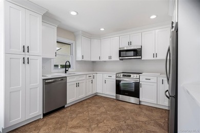 Welcome to this beautifully renovated 4-bedroom, 2-bath Cape - photo 11