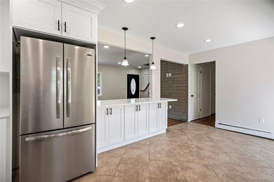 Welcome to this beautifully renovated 4-bedroom, 2-bath Cape - photo 12