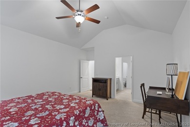 Pristine 2024 Mid-South Club home on an elevated lot with thick - photo 22