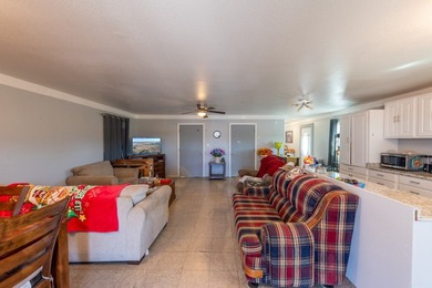 ENJOY THE QUIET OF THE COUNTRY ON THIS BEAUTIFUL 10-ACRE TRACT