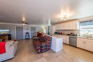 ENJOY THE QUIET OF THE COUNTRY ON THIS BEAUTIFUL 10-ACRE TRACT