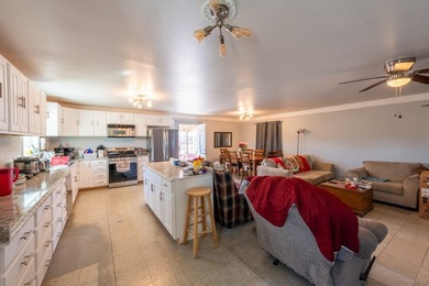 ENJOY THE QUIET OF THE COUNTRY ON THIS BEAUTIFUL 10-ACRE TRACT