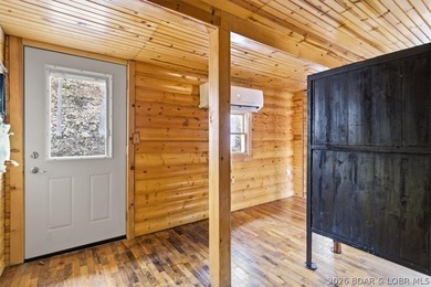 Charming lakefront cabin delivers the perfect blend of - photo 17