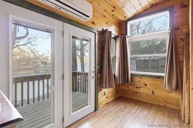 Charming lakefront cabin delivers the perfect blend of - photo 20