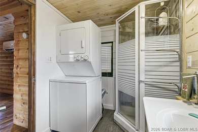 Charming lakefront cabin delivers the perfect blend of - photo 22