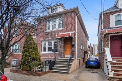Brick detached 2-family home featuring a spacious 5-room - photo 1