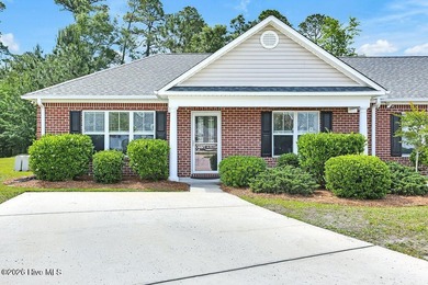 Easy living in Grayson Park with this one-level brick townhome - photo 1