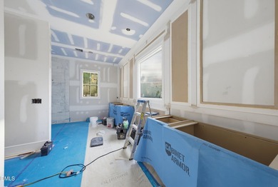 Crafted by Wagoner Homes, this extraordinary 5,032-square-foot - photo 16