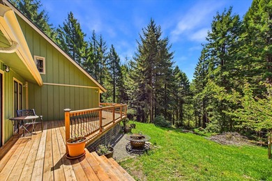 Perched among the trees on 3.24 private acres, this inviting - photo 7